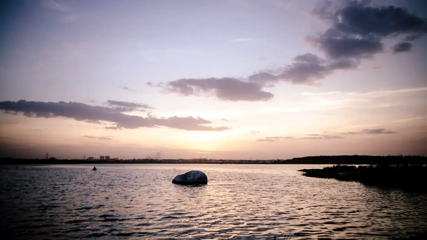 Sunset over the water on the northern edge of Hyderabad
